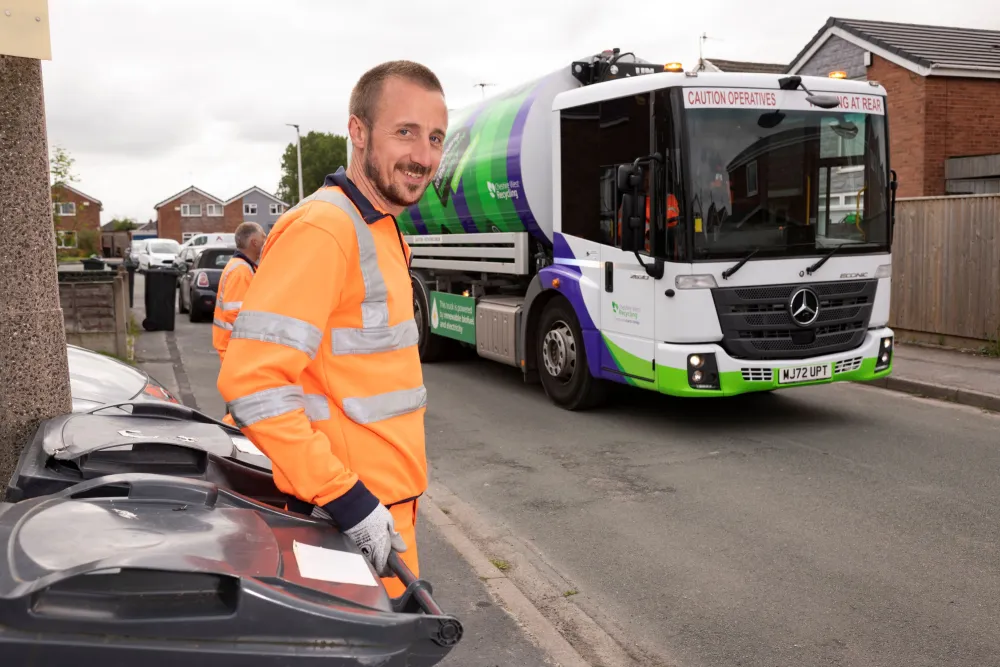 CWR loader collecting bin with smile